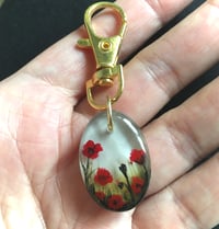 Image 1 of Poppy Field Hand Painted Resin Keyring/Bagcharm