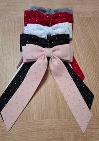 Image 1 of Long tailed cord bows