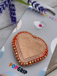 Image 1 of Peach heart phone grip 