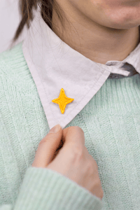 Image 1 of Pin's brodé étoile