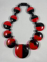 Image 1 of Black and red half eclipse necklace