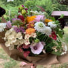 HAND TIED BOUQUET IN PAPER 