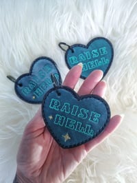 Image 2 of 'RAISE HELL' Keychain 