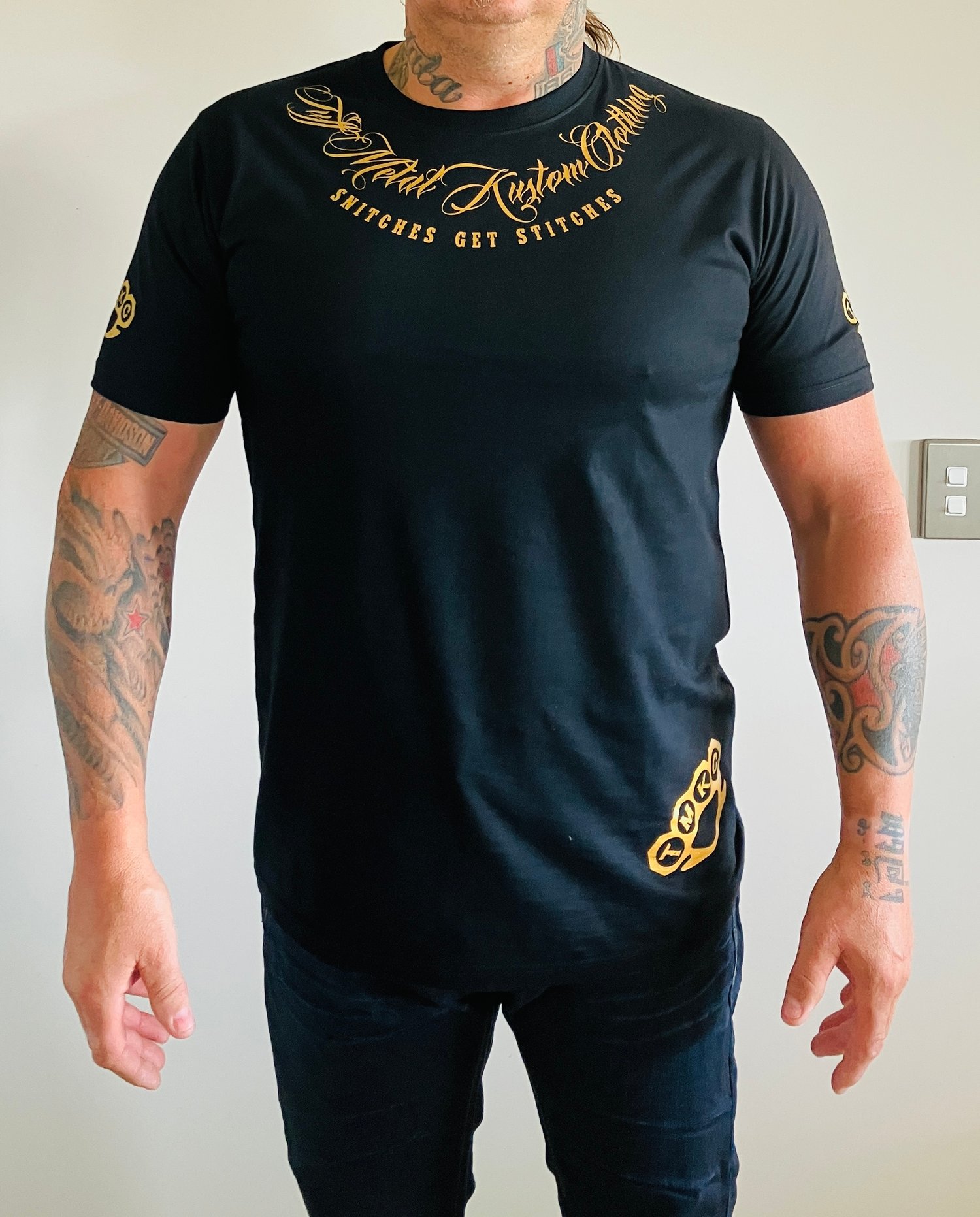 Image of “Snitches get Stitches”Black and Gold Tees