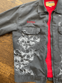 Image 3 of Grey jacket with red lining and white print 