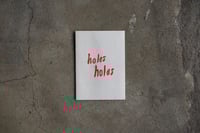 Image 1 of holes holes 