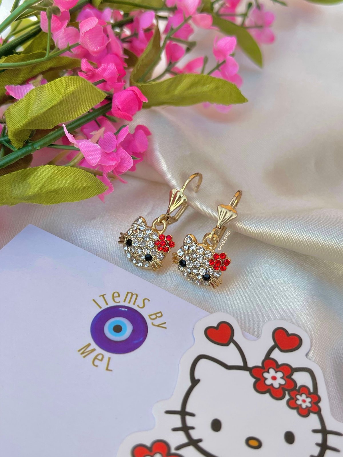 Amazon.com: Sanrio Hello Kitty Womens Dangle Earrings Official License -  Fashion Jewelry Pink Coated Hello Kitty Earrings with Charms: Clothing,  Shoes & Jewelry