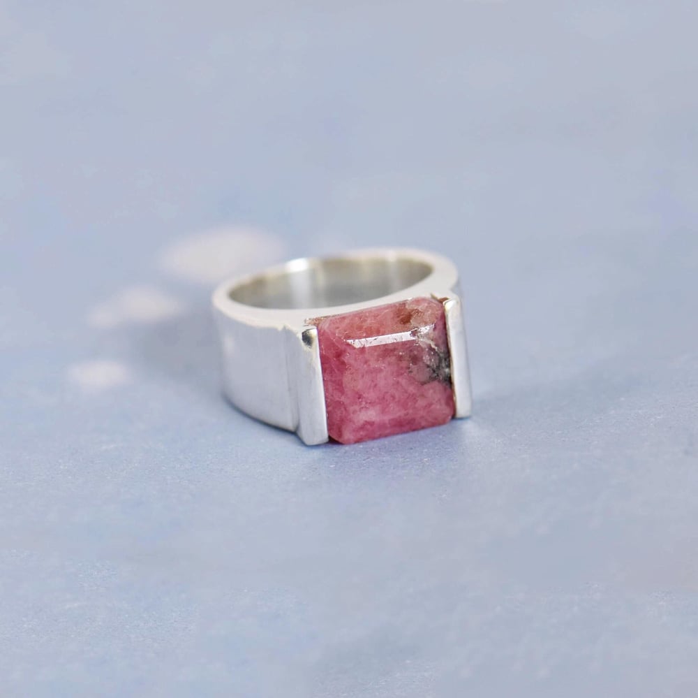 Image of Rhodochrosite square cut wide band solid framed silver ring