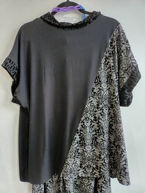 Image of asymmetric black and grey top 