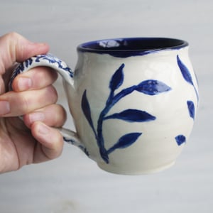 Image of Hand Painted Pottery Mug in Dark Blue and Natural White, 14 oz. Floral Motif Coffee Cup, Made in USA