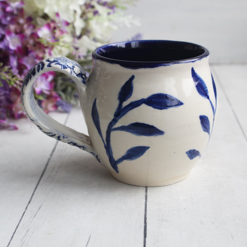 Image of Hand Painted Pottery Mug in Dark Blue and Natural White, 14 oz. Floral Motif Coffee Cup, Made in USA