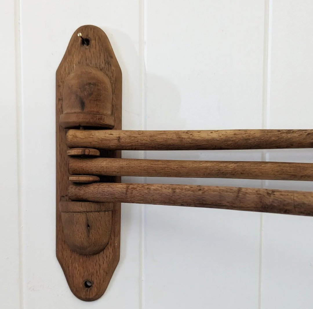 Timber swing arm towel holder