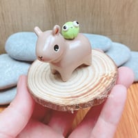 Image 4 of capybara with frog ceramic figurine