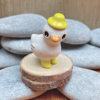 Image 1 of little duck with boots and hat ceramic figurine