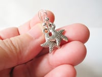 Image 3 of Silver Starfish Charm Earrings