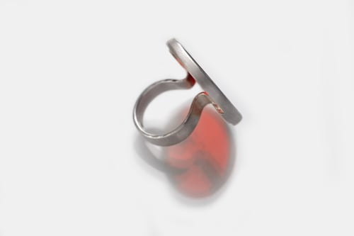 Image of "The Sun illuminates.." silver ring with red acrylic glass 40mm · SOL CUNCTA SUA ·