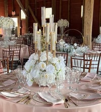 Gold candlelabra with base Artificial flowers 