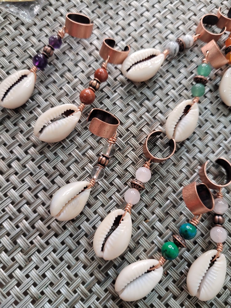 Image of Cowrie loc and braid jewelry 