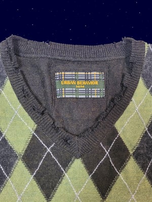 Distressed argyle knit