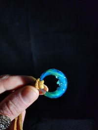 Image 3 of Simplistic crescent moon pendant. (Double sided face sculpt)