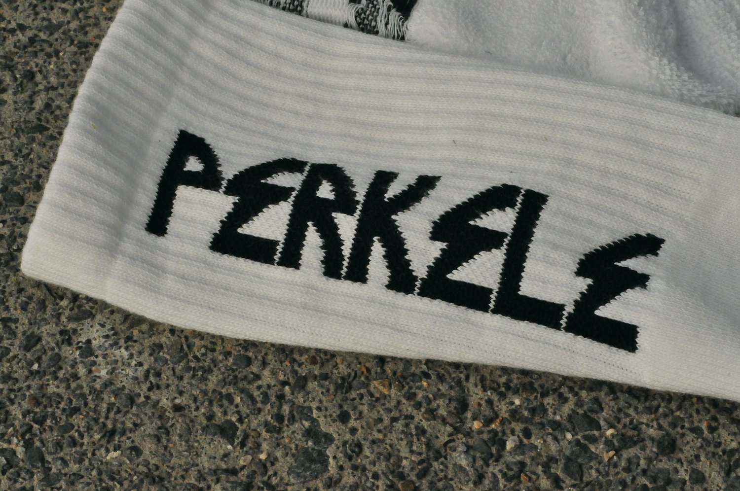 Image of White 7 inch tall 'PERKELE' sock