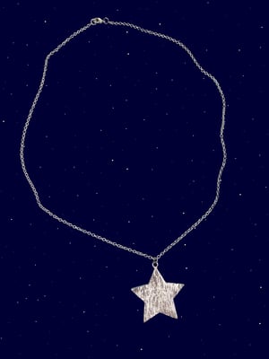 Blue sparkly star necklace