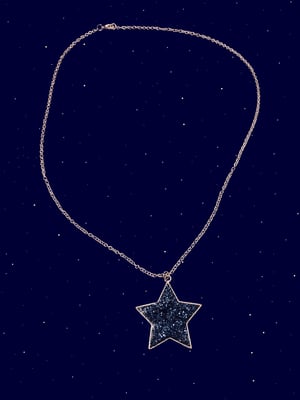 Blue sparkly star necklace
