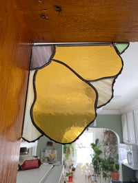 Image 1 of Corner sun flower