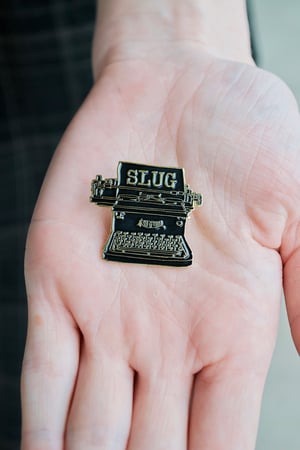 SLUG Typewriter Pin