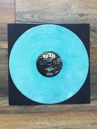 Image 3 of REZN - Calm Black Water. LP. Crystal clear, transparent blue, white marbled.