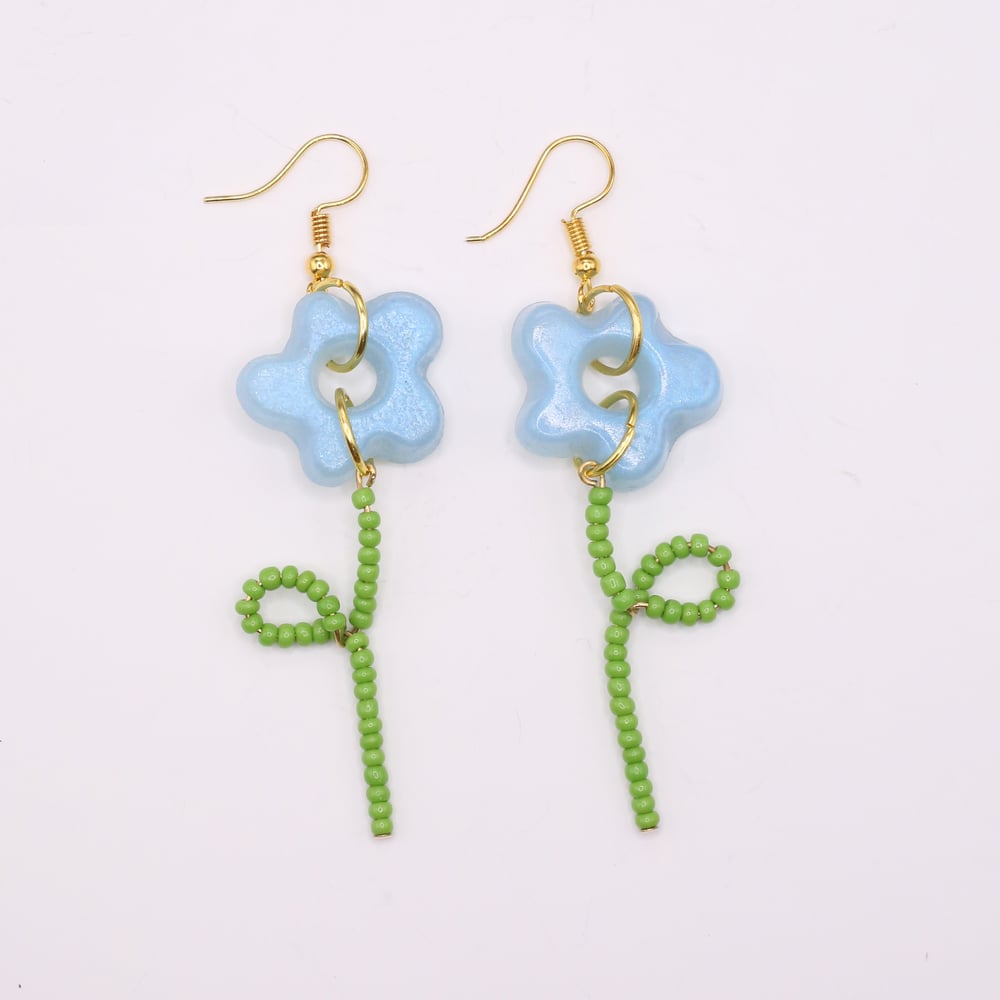 Image of Iridescent Blue Flower and Stem Earrings