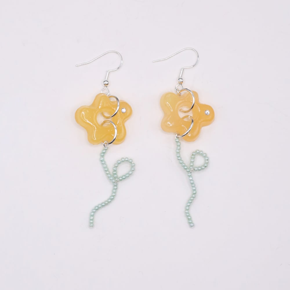 Image of Opaque Orange Flower and Stem Earrings