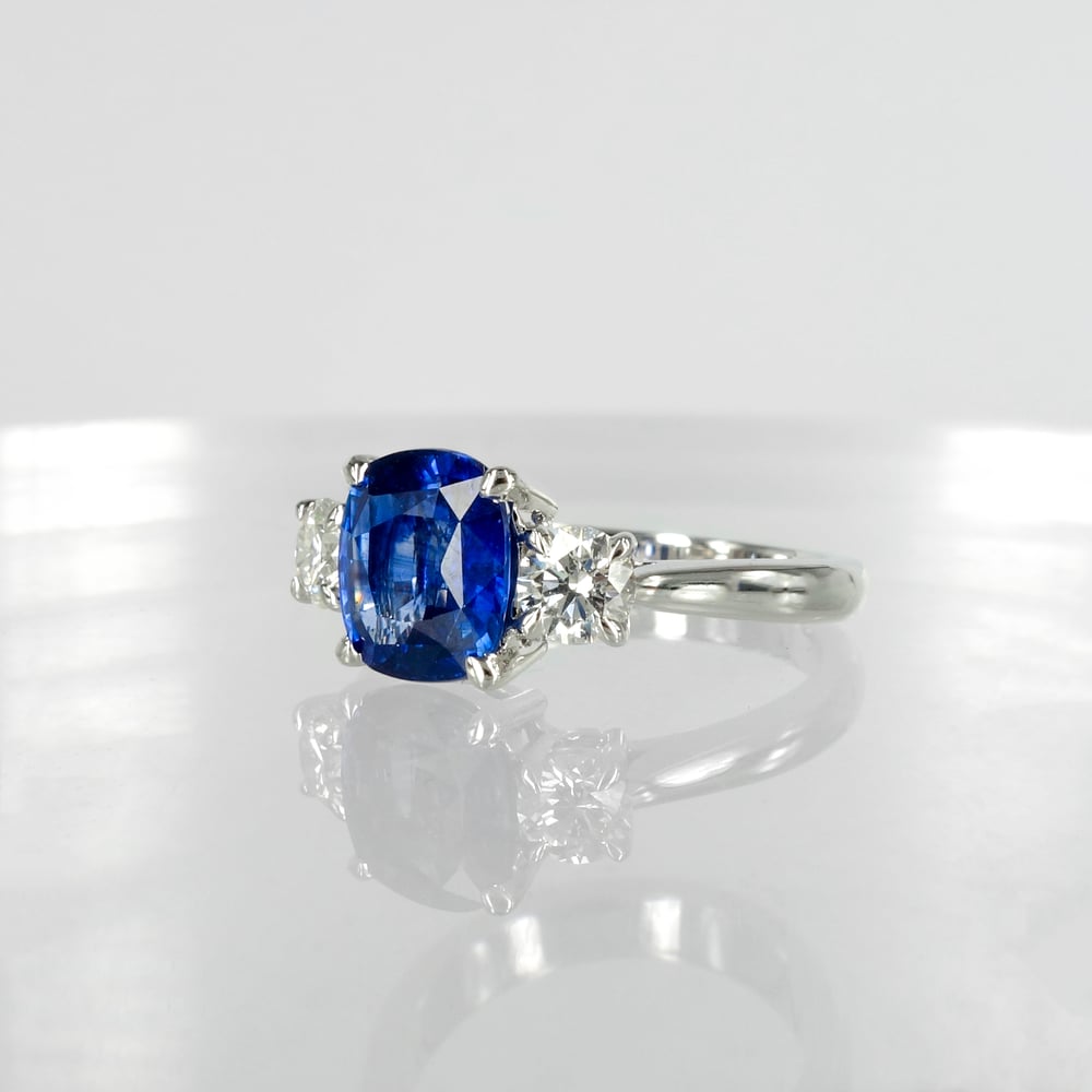 Image of 18ct white gold Sapphire and Diamond engagement ring. PJ6017