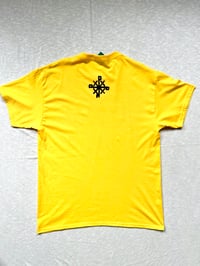 Image of the smile/frown tee in yellow 