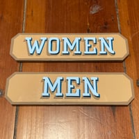 Women/Men Signs
