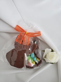 Solid milk chocolate bunny box filled with Easter candy corn.