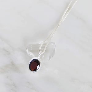 Image of Fire Red Garnet oval cut silver necklace