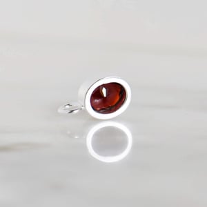 Image of Fire Red Garnet oval cut silver necklace