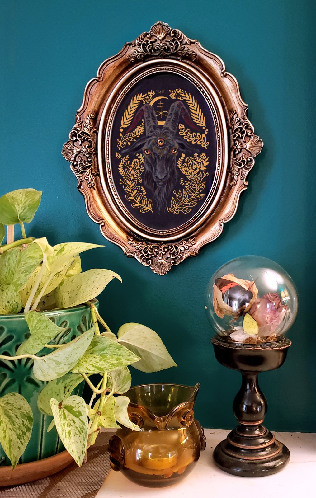 Black Goat in antiqued oval frame | Mheld