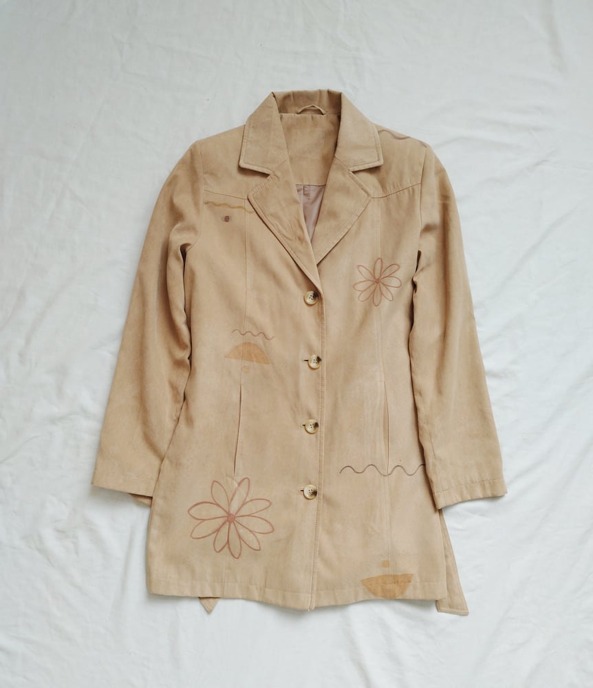 Image of retro babe trench coat