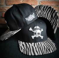 Image 1 of THE ZEBRA