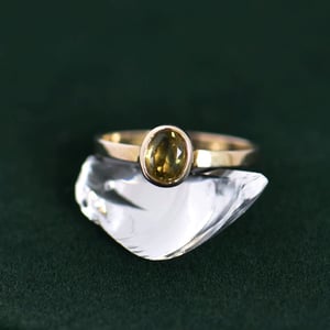 Image of Tanzania Yellowish Green Sapphire 10k gold flat band ring