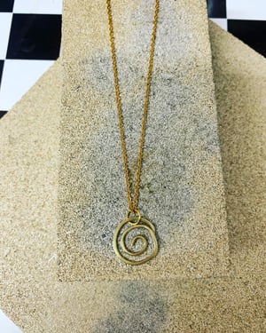 Image of "Move!" hammered brass necklace