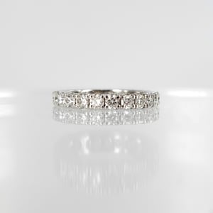 Image of 18ct white gold full circle diamond set band. PJ5850