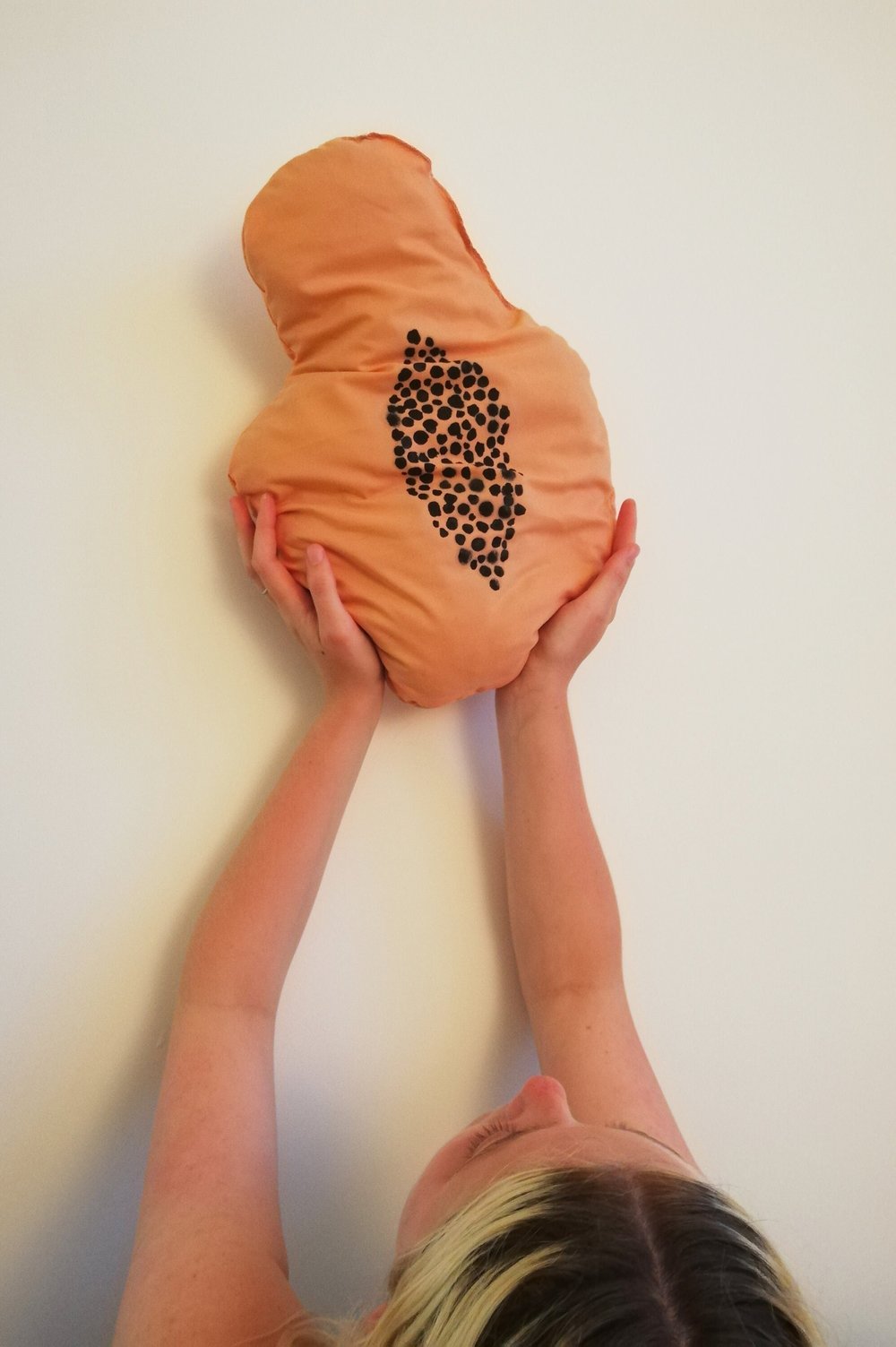 Image of Greer Pester Papaya Fertility Faceplant Cushion