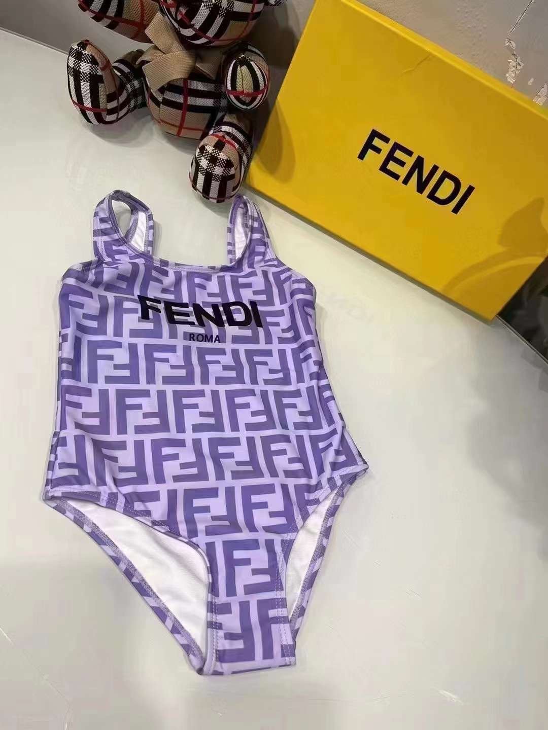 Image of Girls loves purple swimsuit