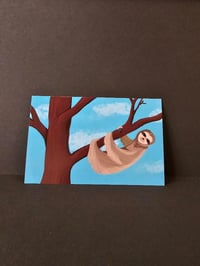 Image 1 of Hanging sloth
