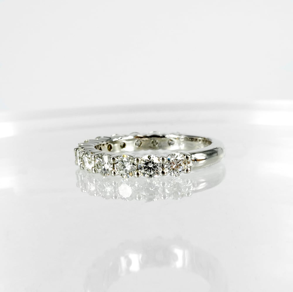 Image of 18ct white gold .08pt diamond set eternity band. M3273