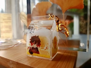 Image of genshin | zhongli's osmanthus milkie (liquid charm) 