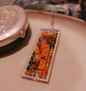 Image of earring | molten sea (holo version)